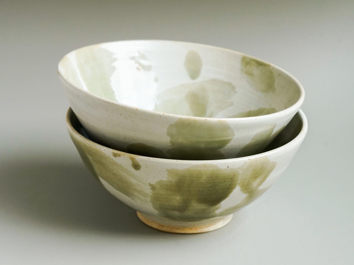 white and green bowl